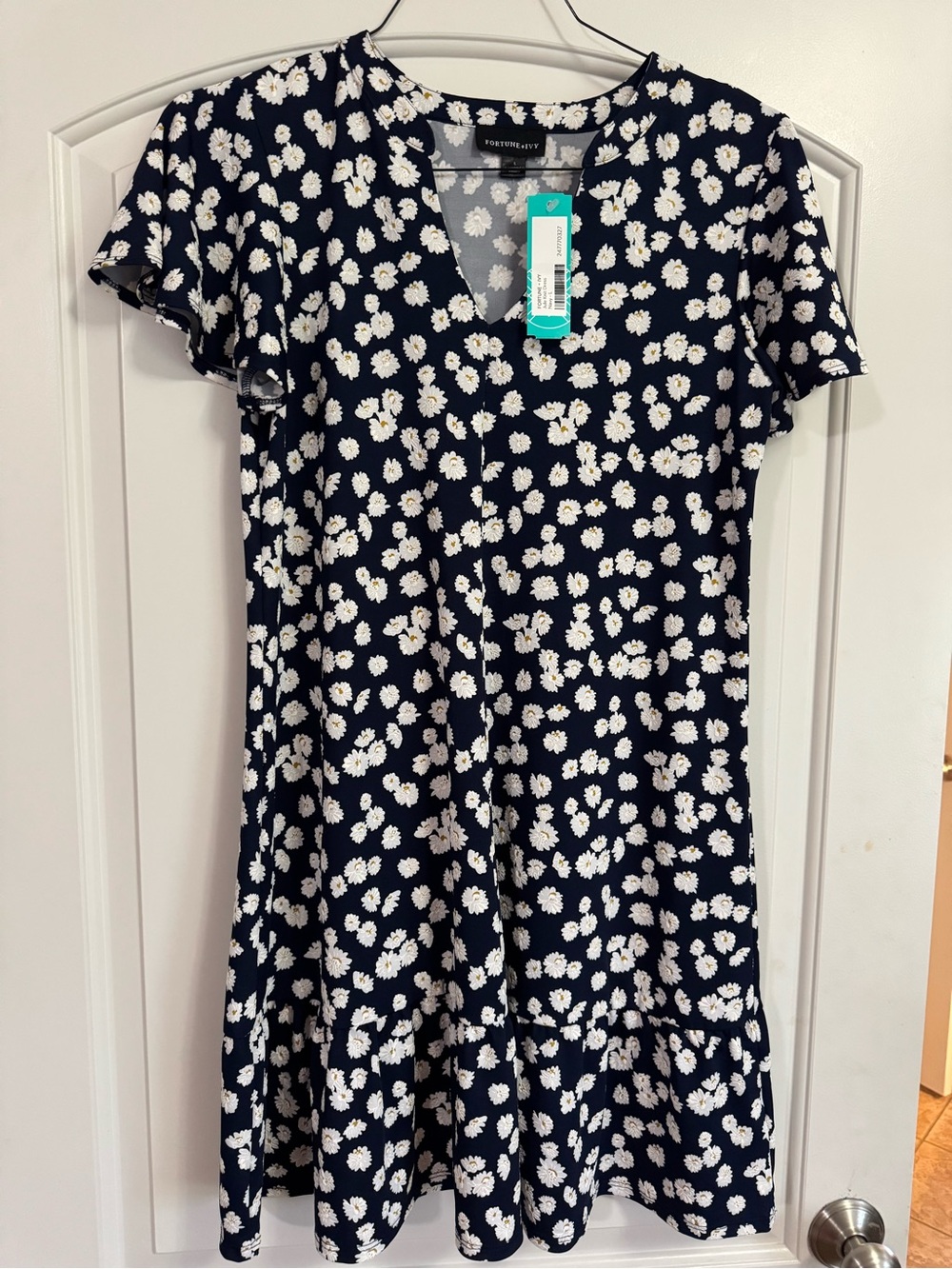 Floral Navy V‑Neck Ruffle Hem Dress